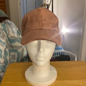 Pink cap with adjustable strap in the back